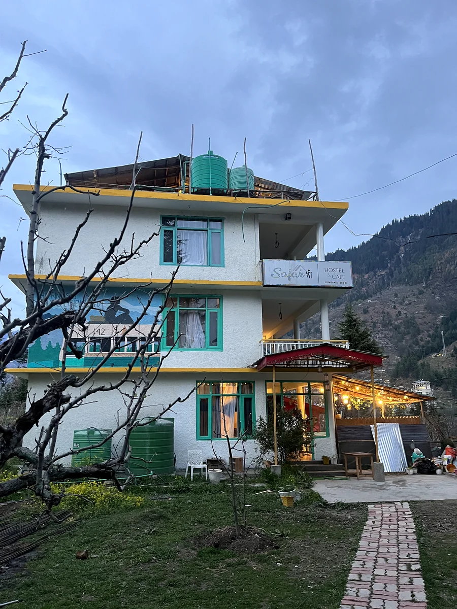 Safar Hostel in its Old Manali orchard setting